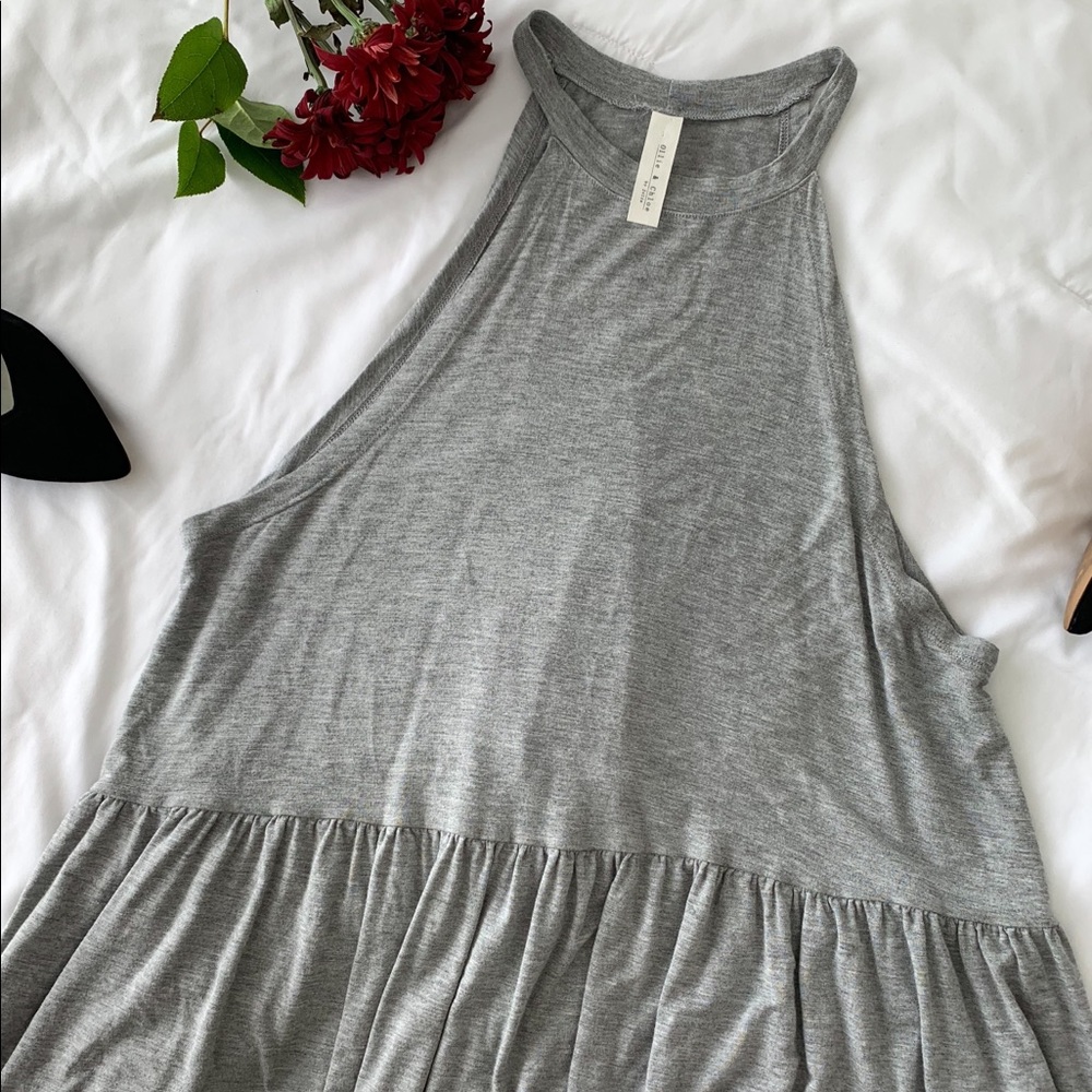 Ollie and Chloe Jolie High Neck Peplum Tank Top